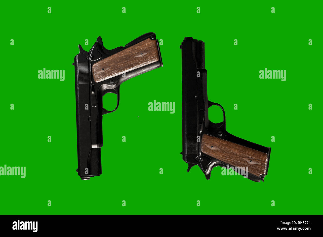 guns isolated on green background 3d illustration Stock Photo - Alamy