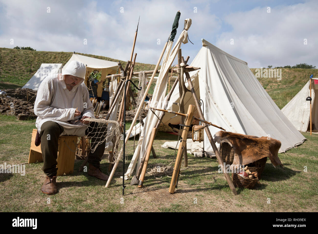 Anglo Saxon making fishing net at Norfolk history festival Stock Photo