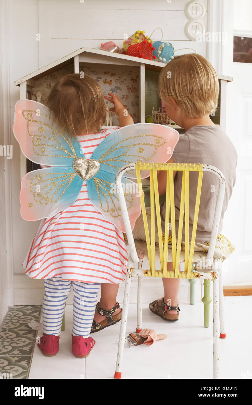 Girls playing doll house hi-res stock photography and images - Alamy