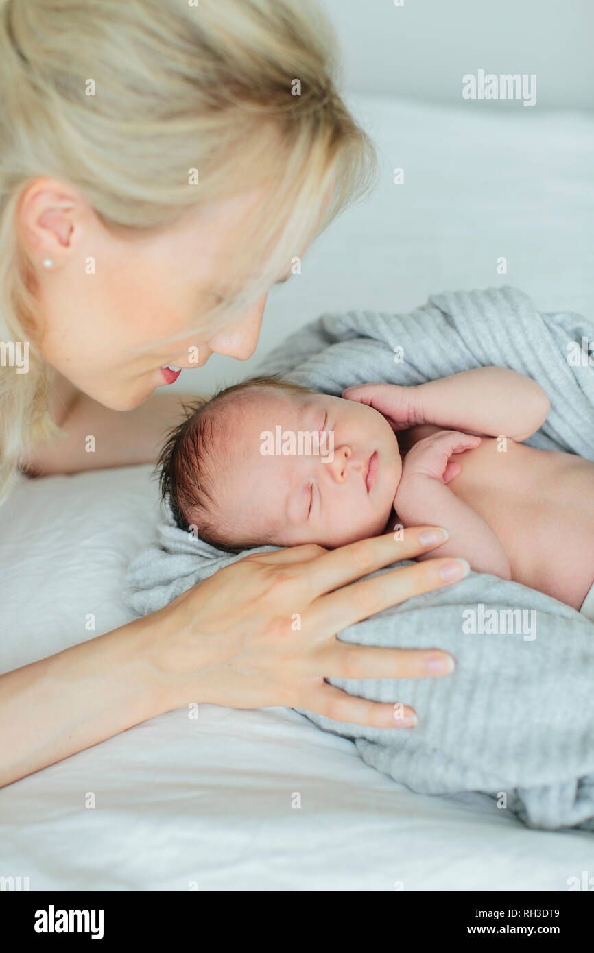 Mother sleeping newborn hi-res stock photography and images - Alamy