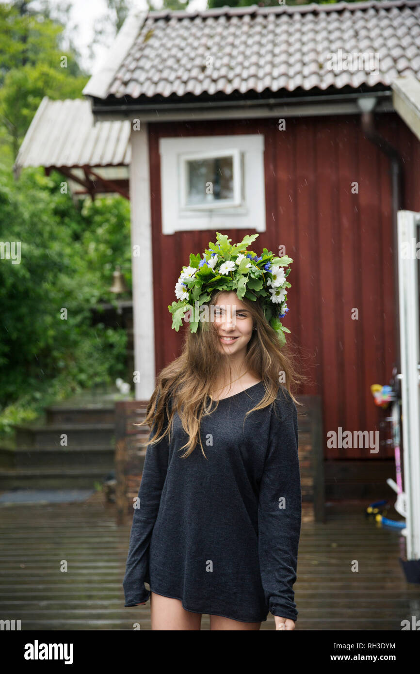 Woman wearing flower wreath Stock Photo
