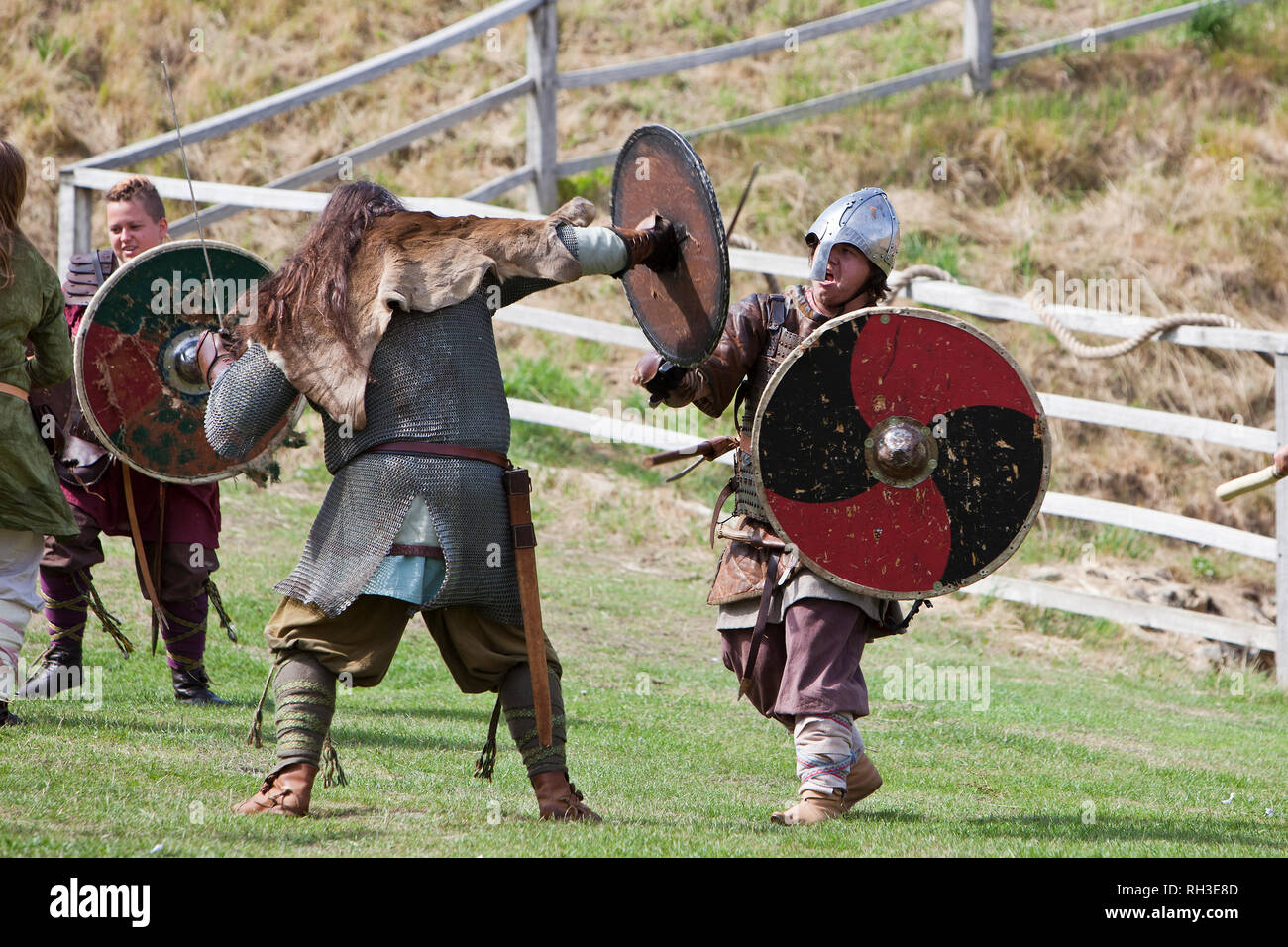 Battle re-enactment between vikings and Saxons at Castle Rising's 'Soldiers Through the Ages' event in Norfolk, England. Stock Photo