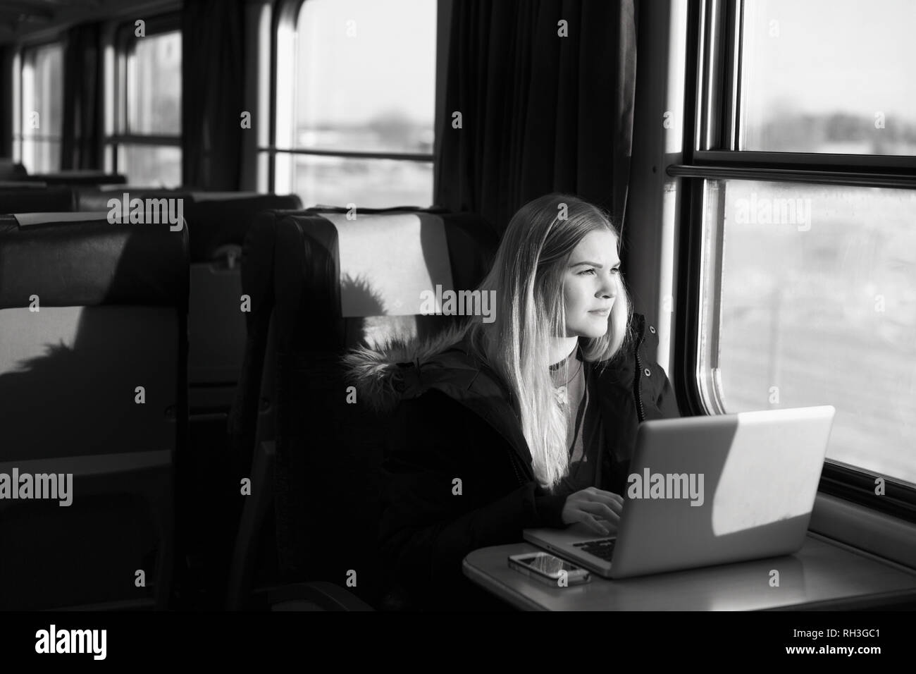 Working with laptop in train hires stock photography and images Alamy