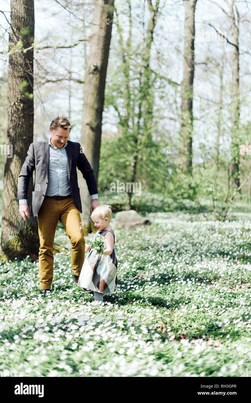 Father and daughter together in the forest hi-res stock photography and ...