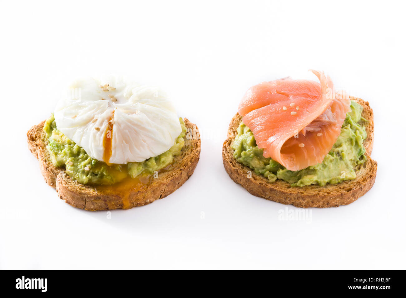 Toasted Breads With Avocado Poached Eggs And Salmon Isolated On White