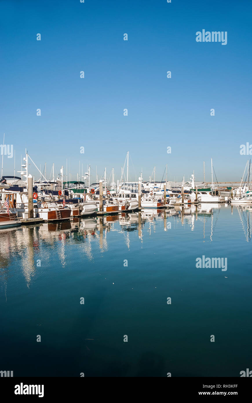 Boats are in a line at a marina in Bellingham, Washington Stock Photo