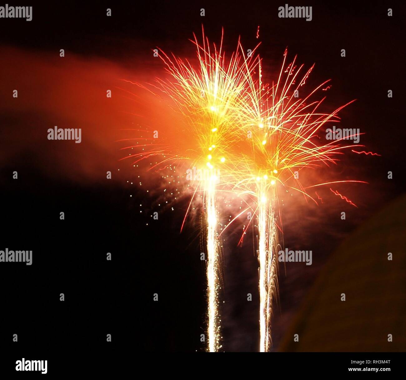 Pop Rockets Explode 2 Rockets explode at the same Time Stock Photo - Alamy