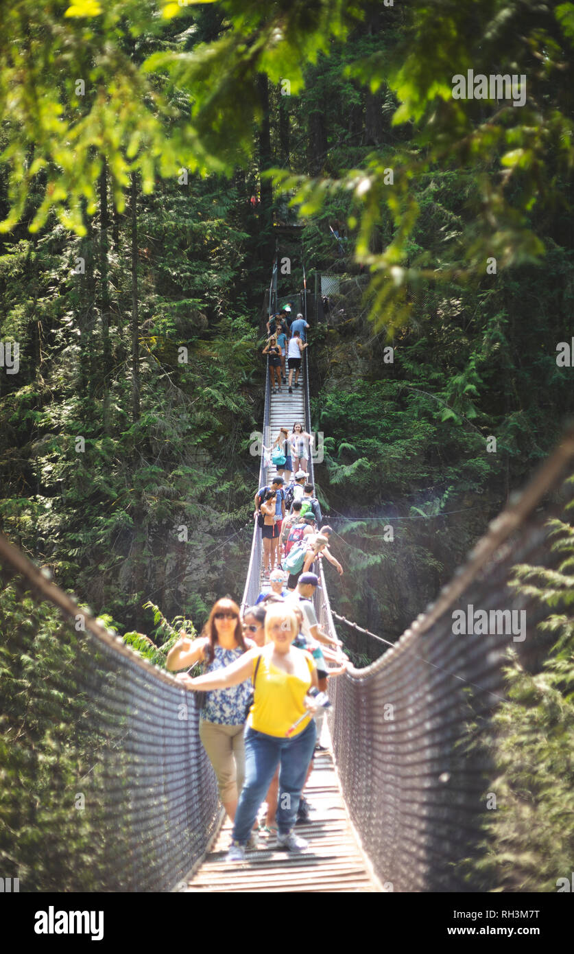 Crowded Lynn Valley Suspension Bridge, Vancouver, British Columbia Stock Photo