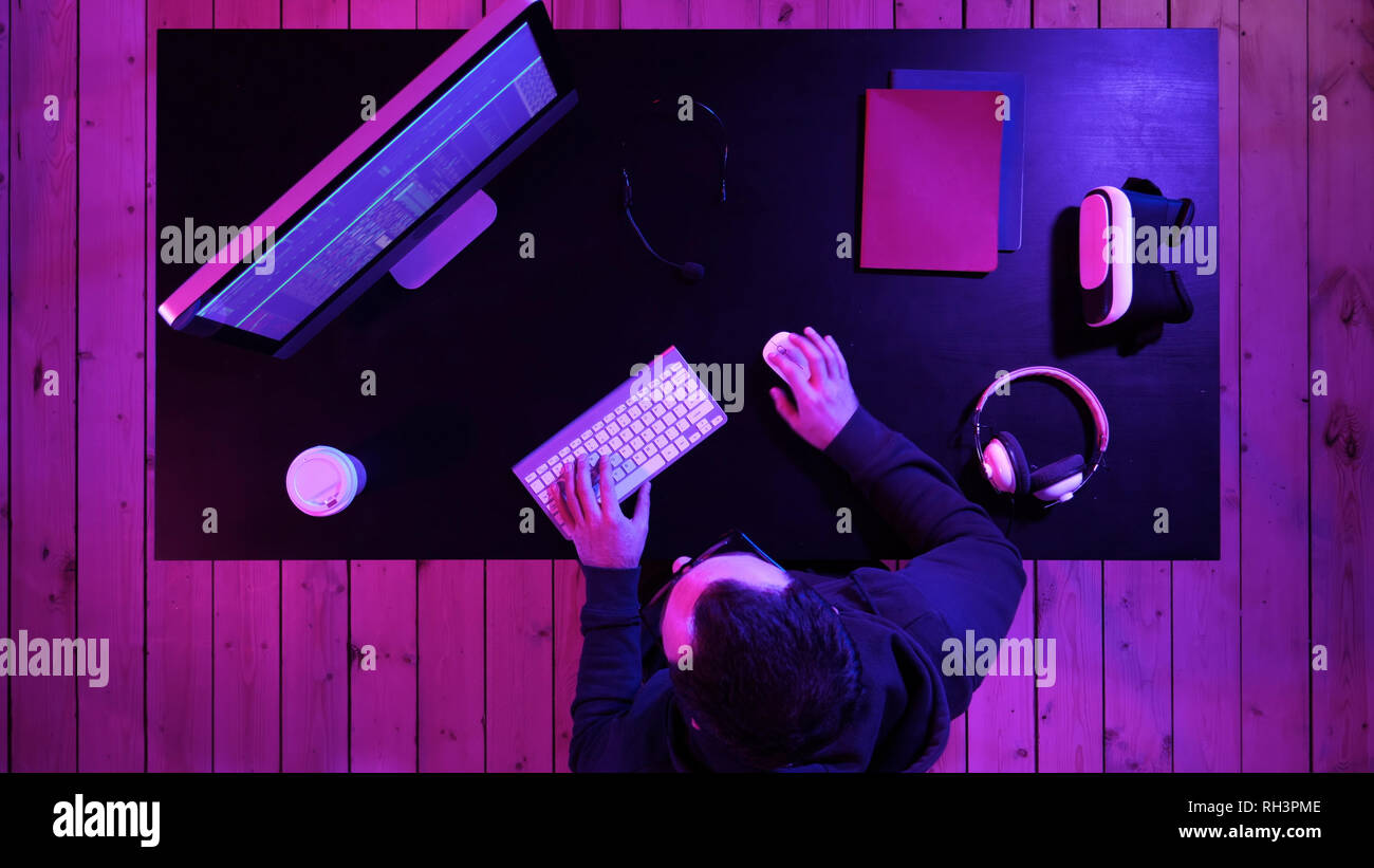 Hacker at the computer hacking. Stock Photo