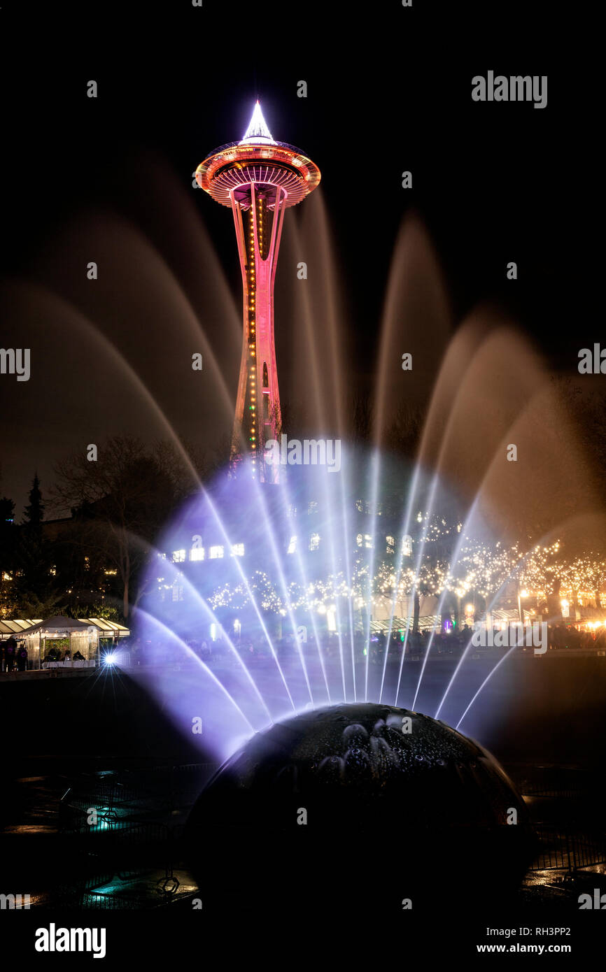 WA17061-00...WASHINGTON - The Space Needle and the International Fountain in the Seattle Center on New Years Eve 2018. Stock Photo