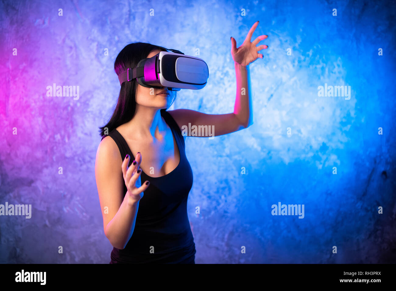 Excited asian woman vr goggles hi-res stock photography and images - Alamy
