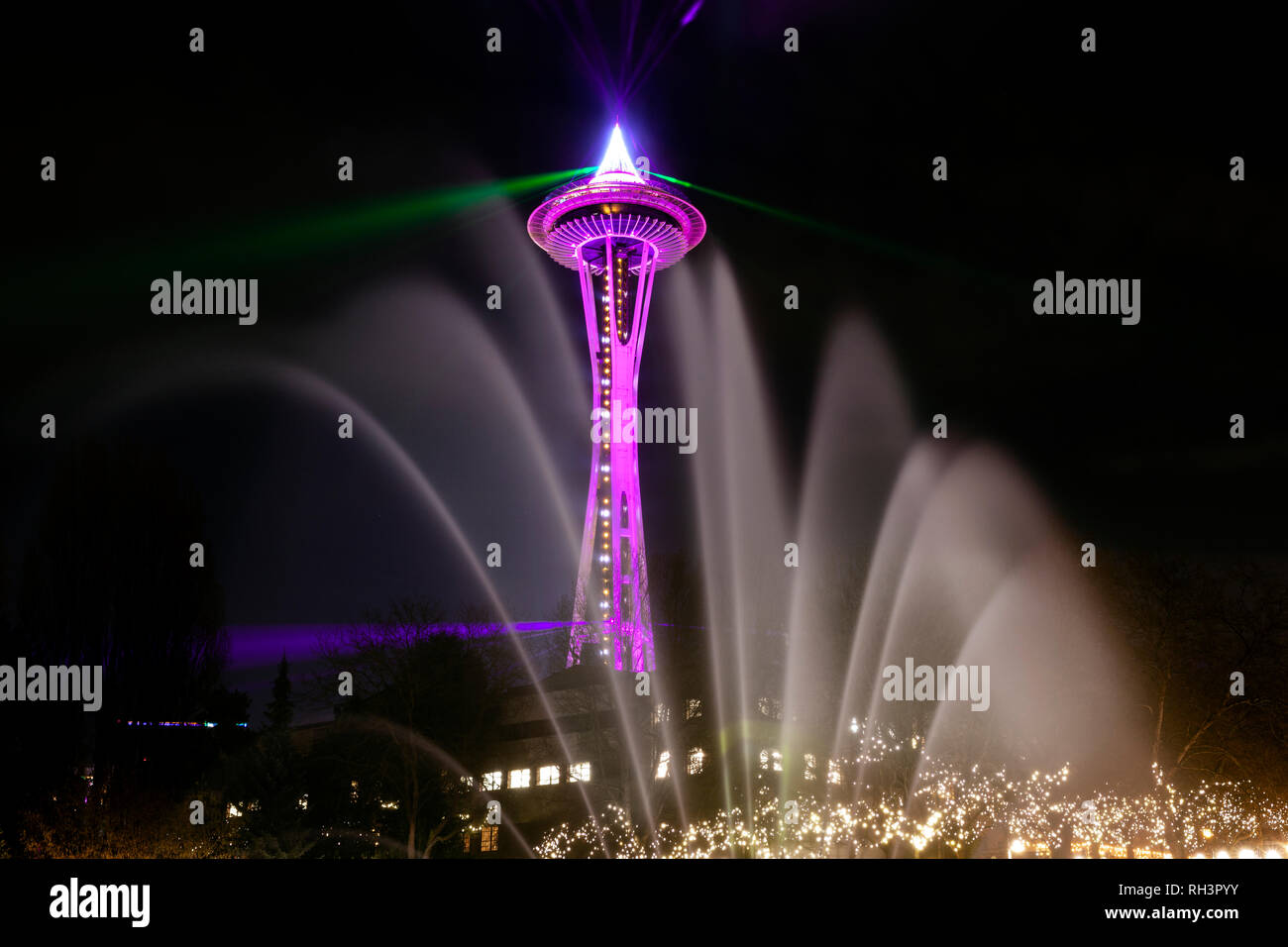 WA17066-00...WASHINGTON -  The Space Needle and the International Fountain in the Seattle Center on New Years Eve 2018. Stock Photo