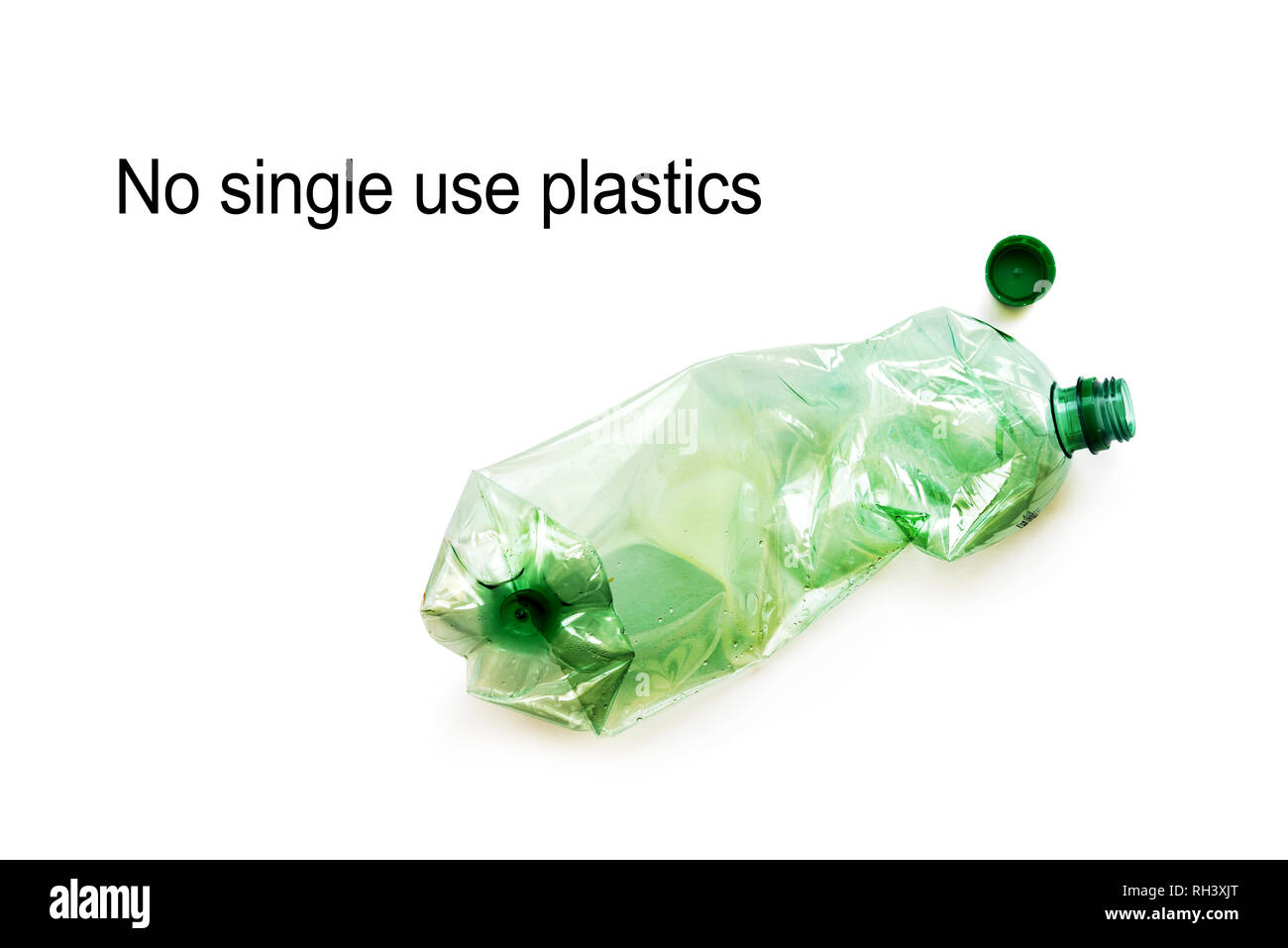 Used plastic bottles crushed and crumpled against isolated on the white