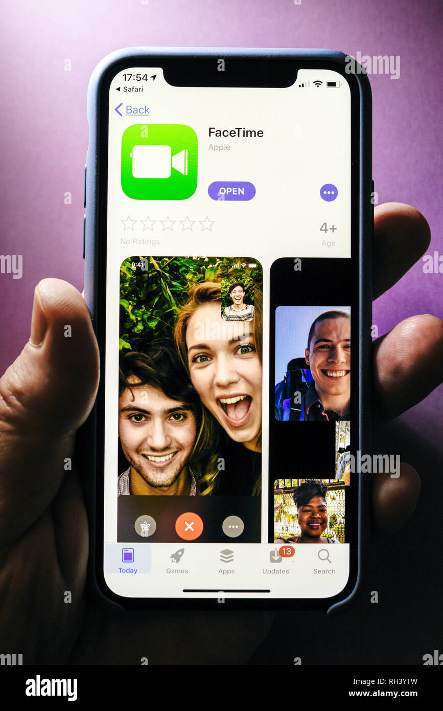 Paris, France Jan 30, 2018 Man hand holding Apple iPhone XS with FaceTime app in Apple Store