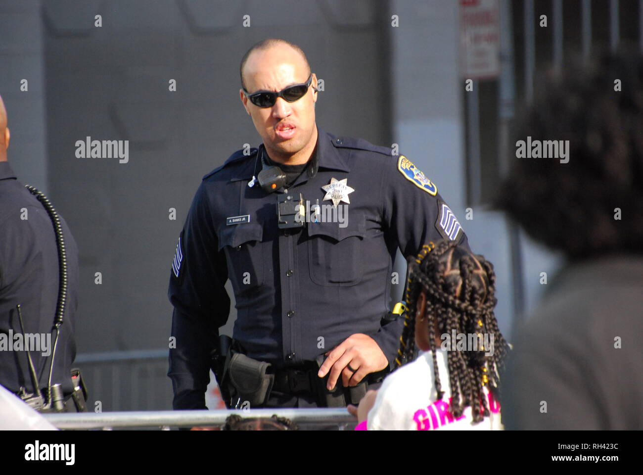 Oakland police Officer Anthony Banks Jr. providing security outside a Kamala Harris for President rally in downtown Oakland on Jan. 27, 2019. Stock Photo
