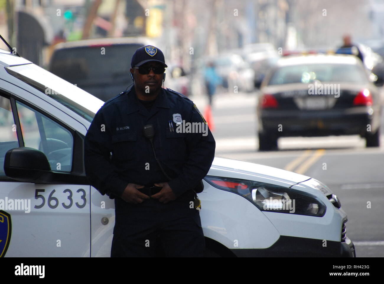 Oakland police Cadet D. Wilson providing security outside a Kamala Harris for President rally in downtown Oakland on Jan. 27, 2019. Stock Photo