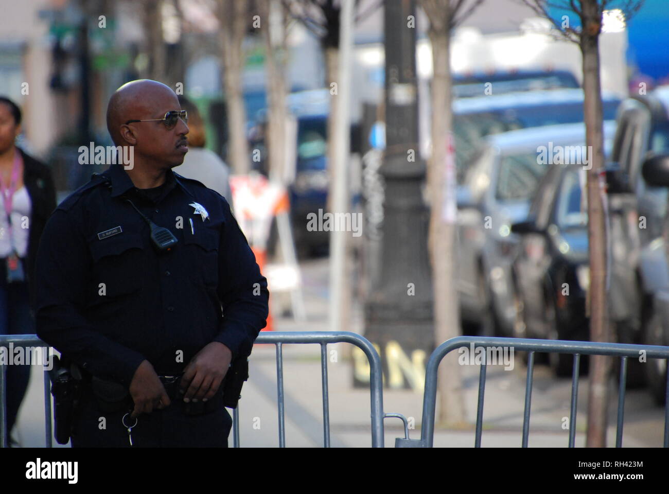 Oakland police Officer George Buford providing security outside a Kamala Harris for President rally in downtown Oakland on Jan. 27, 2019. Stock Photo