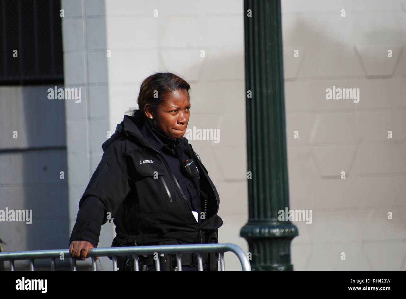 Oakland police Officer JaNey Meeks providing security outside a Kamala Harris for President rally in downtown Oakland on Jan. 27, 2019. Stock Photo