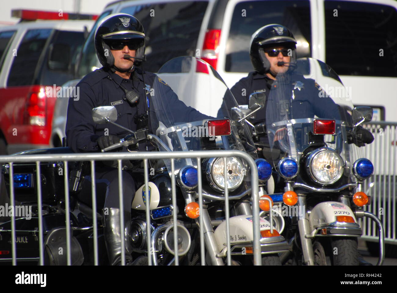 Oakland police Officer Jerry Sanchez and another officer patrol on motorcycle outside a Kamala Harris for President rally in downtown Oakland on Jan. 27, 2019. Stock Photo