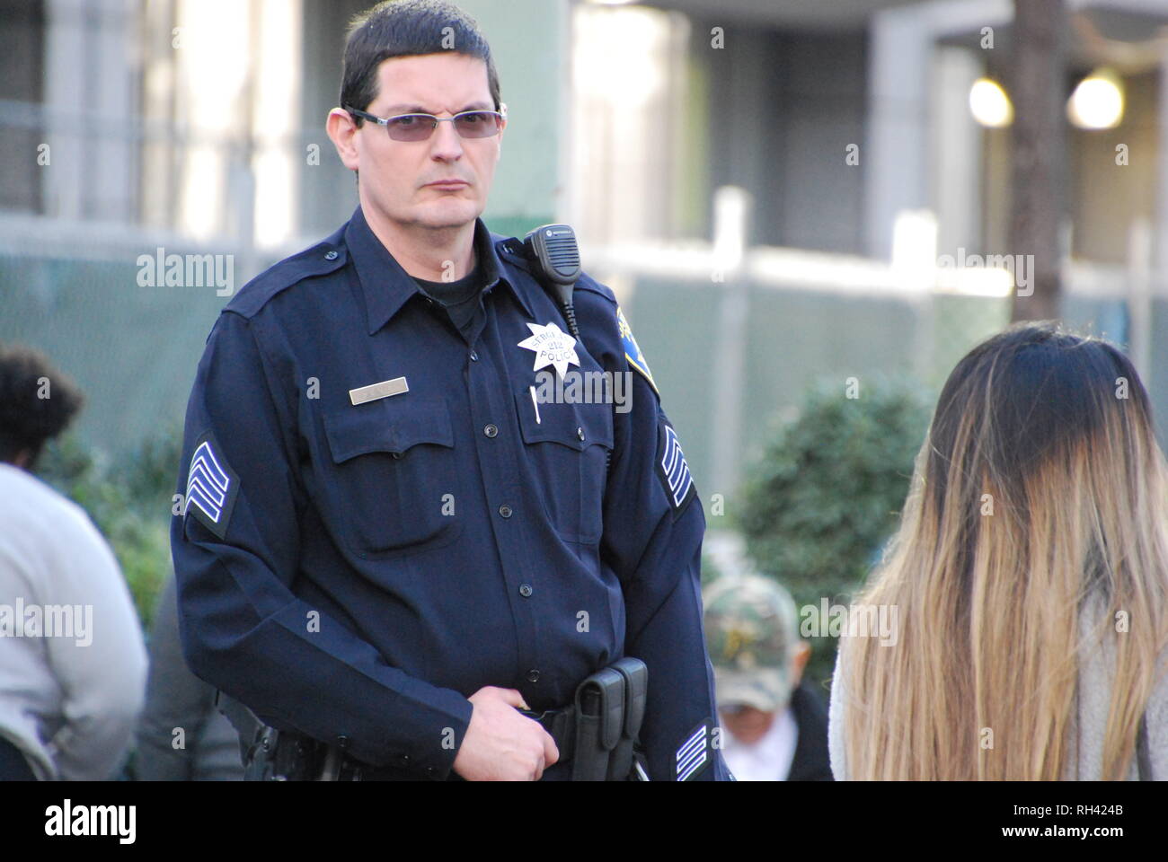 Oakland police Sgt. Barry Donelan, president of the Oakland Police Officers Association, providing security outside a Kamala Harris for President rally in downtown Oakland on Jan. 27, 2019. Stock Photo