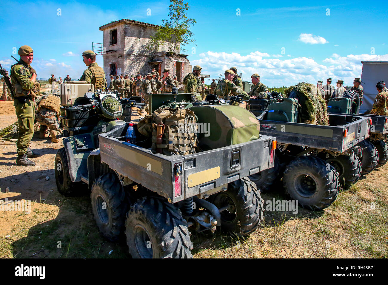 NATO soldiers and military equipment. International Military Training
