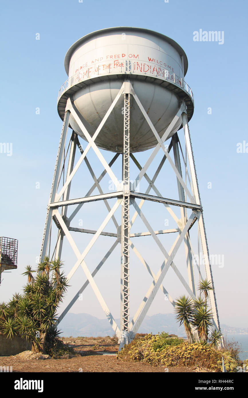 Alcatraz Water Tower, Alcatraz Island, San Francisco Bay, California, USA. Graffiti from the 1969-71 Occupation of Alcatraz is visible. Stock Photo