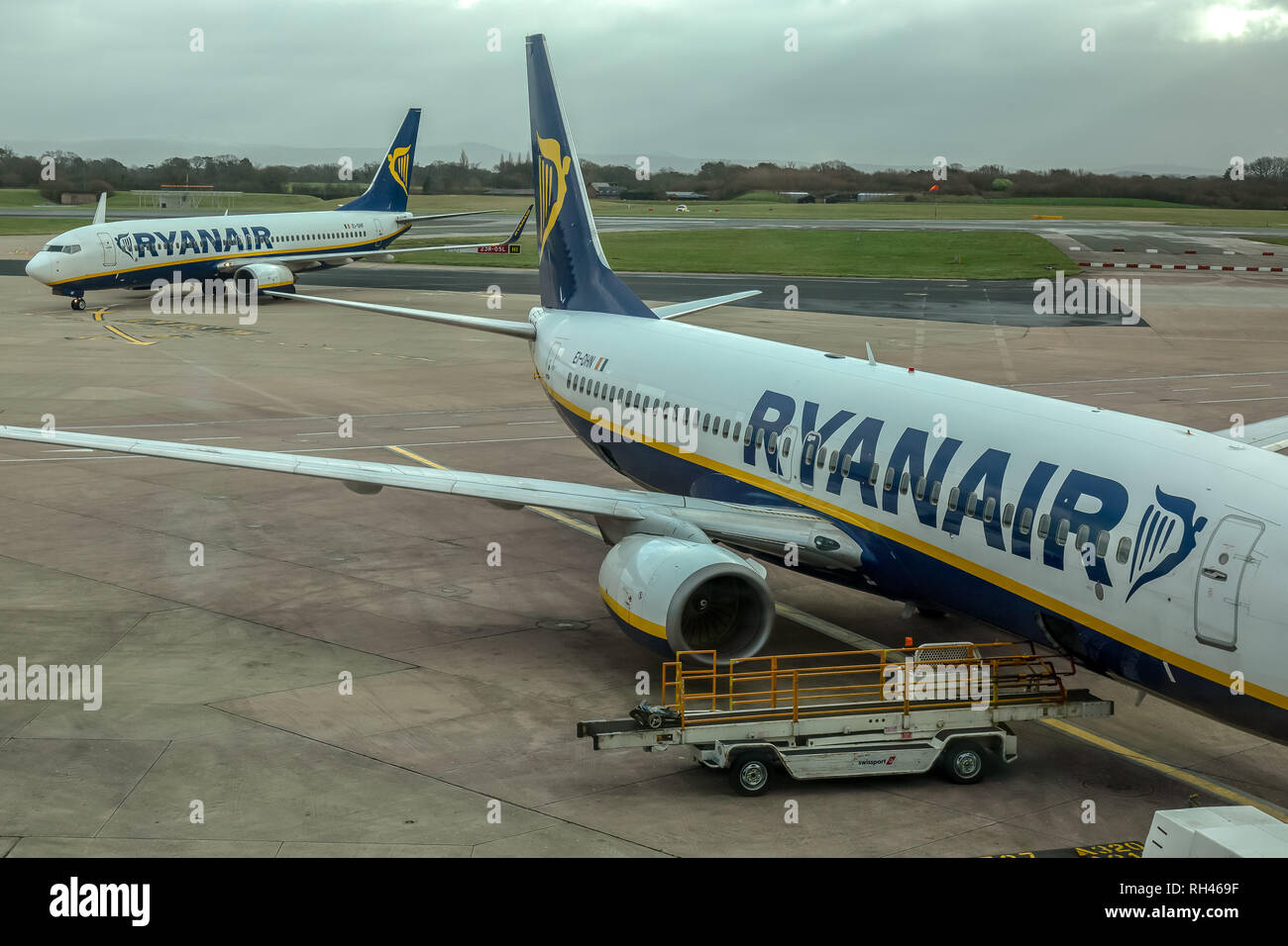 Two Ryanair Boeing 737-800 aircraft at Manchester Airport in England. Stock Photo