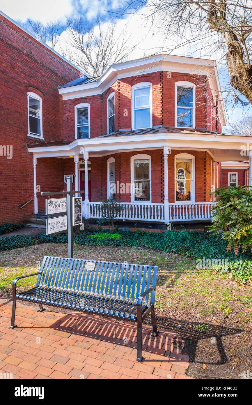 DAVIDSON, NC, USA-1/24/19: An historic house on Main Street is occupied by Davidson Violins and The Bird's Nest Music Studio. Stock Photo