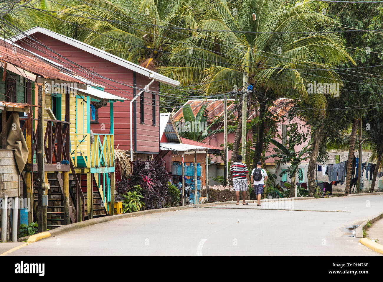People walk down the streets of the Garifuna village of Punta Gorda, Honduras. Stock Photo