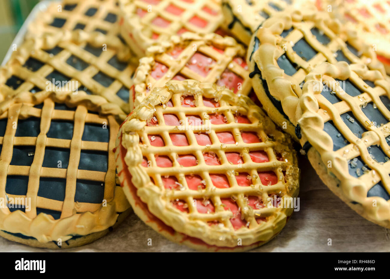 Iced shortbread sandwich cookies are decorated like pies for Pi Day at a bakery in Northport, Alabama. Stock Photo