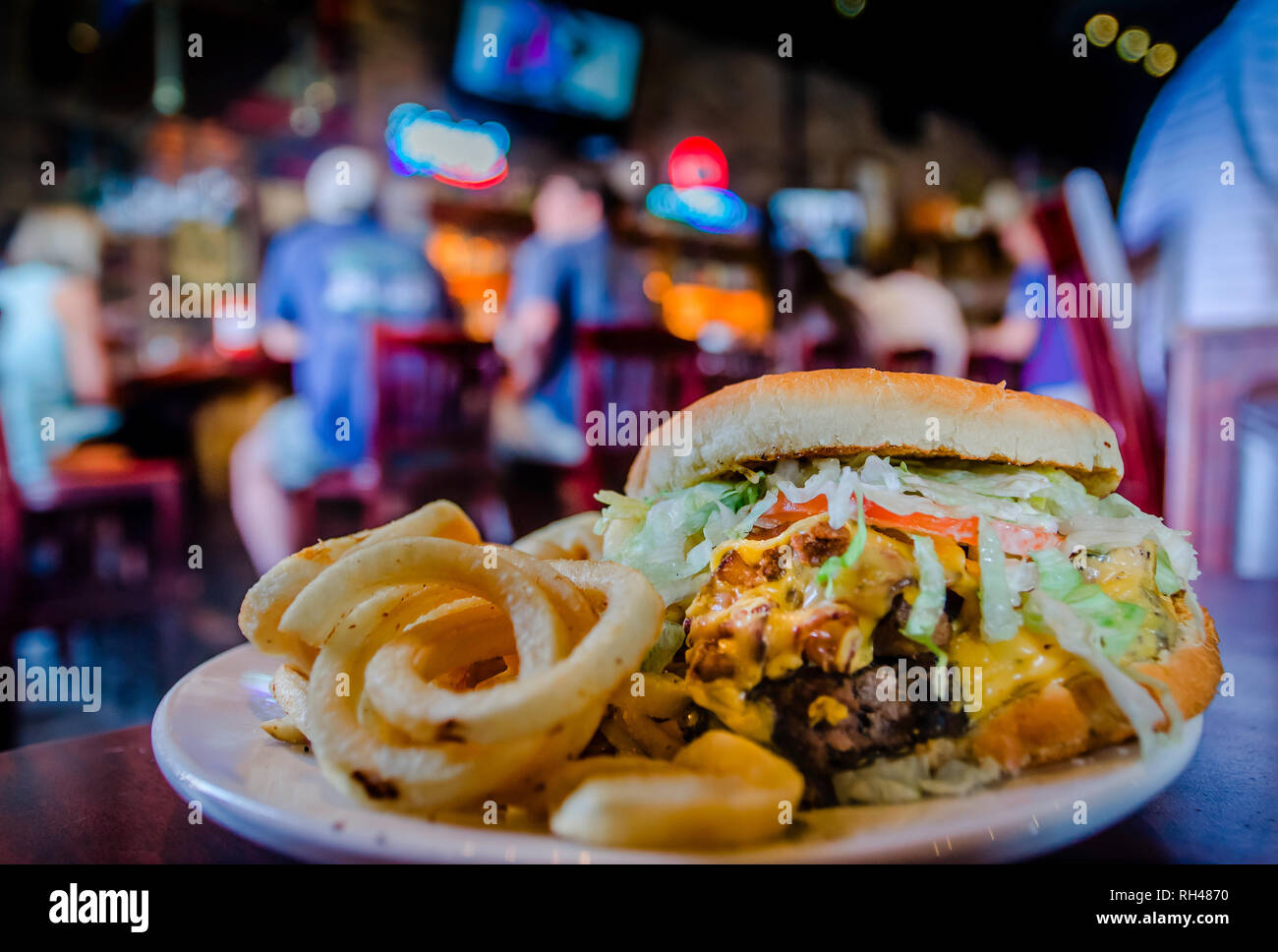 The Farmer Brown cheeseburger features Angus beef, American cheese, and hickory-smoked bacon at Buffalo Phil's in Tuscaloosa, Alabama. Stock Photo