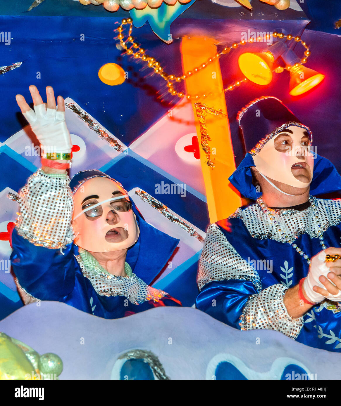 Members of the Krewe of Hermes throw beads during a Mardi Gras parade, Feb. 28, 2014, in New Orleans, Louisiana. Stock Photo