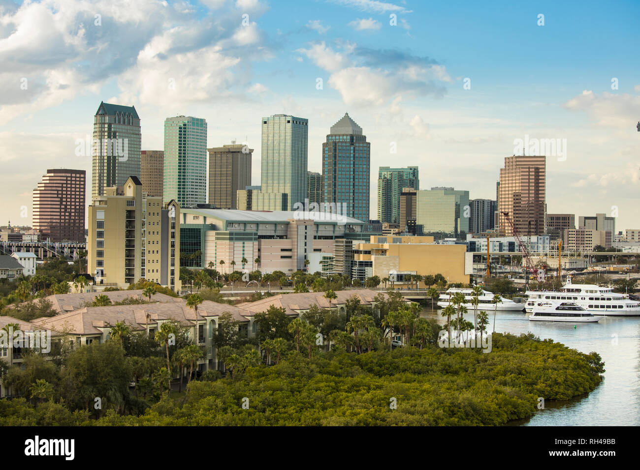 Low aerial view of downtown Tampa, Florida, expensive homes, and port. Stock Photo