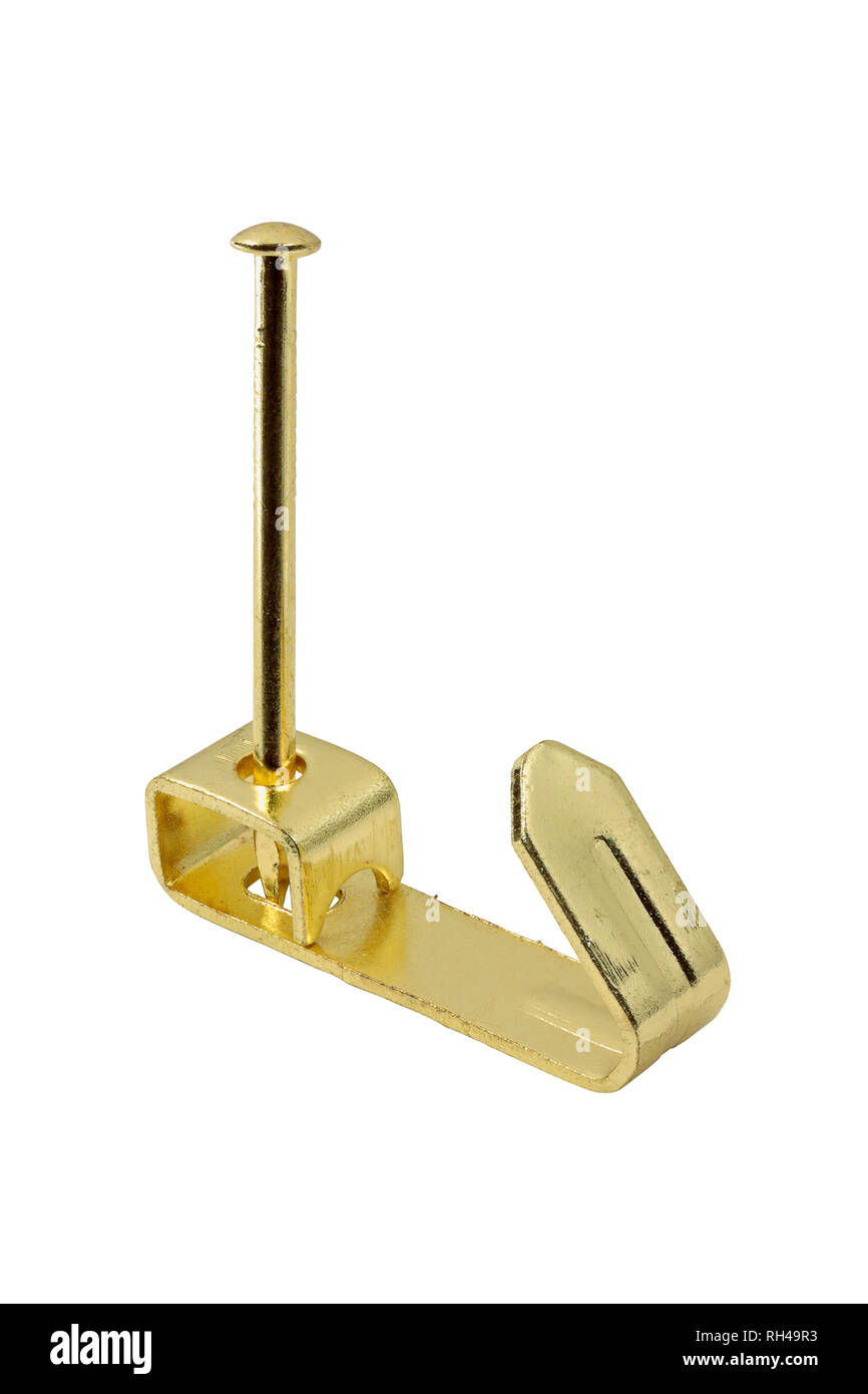 A brass plated Standard No.1 Picture Hook with picture pin isolated on a white background Stock Photo