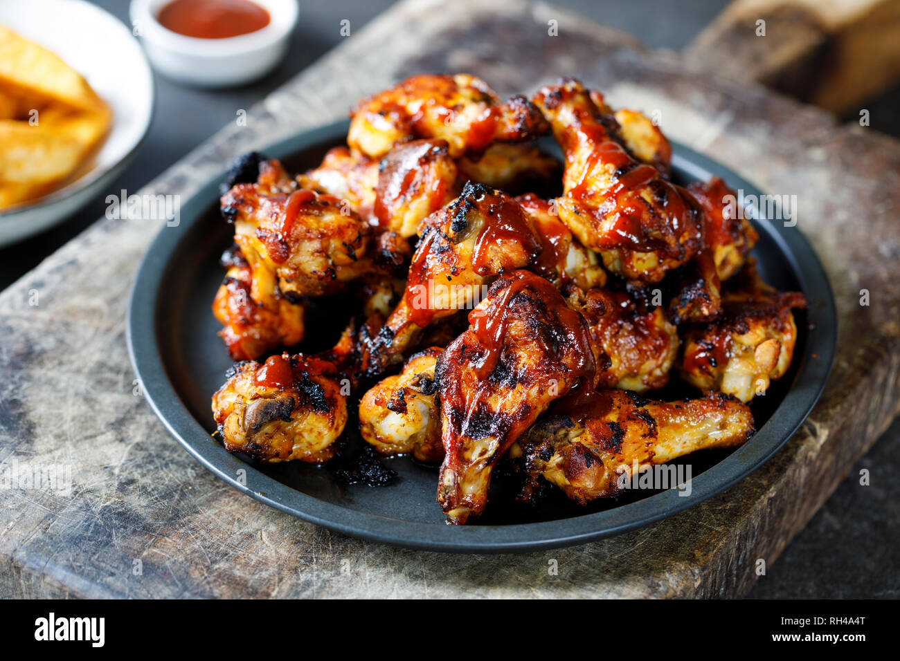 Barbecue chicken wings with sauce Stock Photo