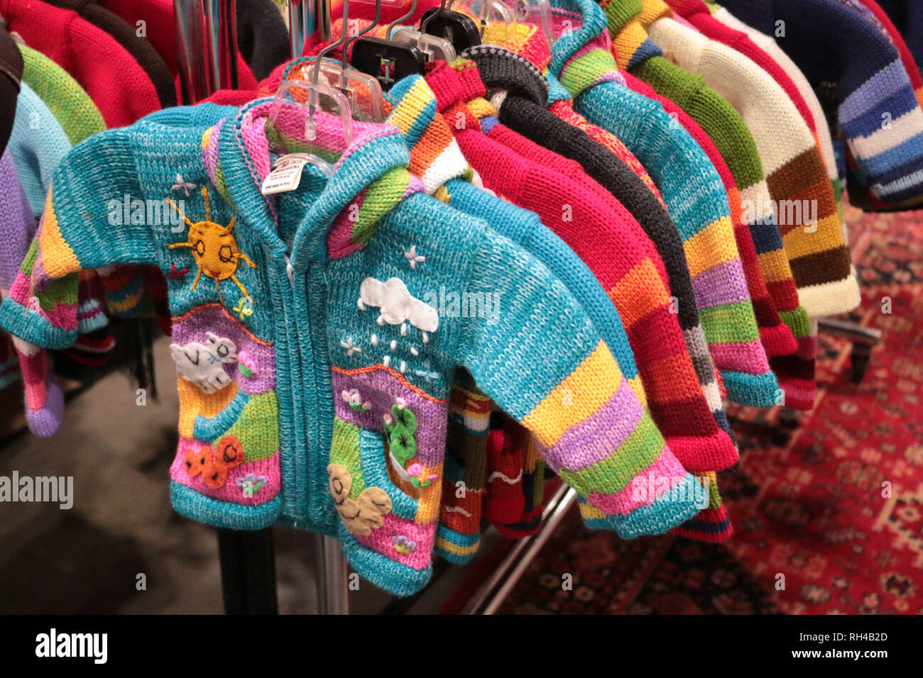Beautiful high end baby clothes hi-res stock photography and images - Alamy