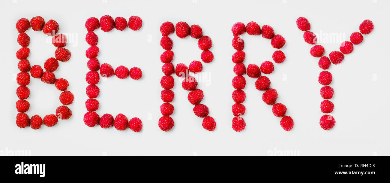 BERRY text arranged in raspberry fruit Stock Photo