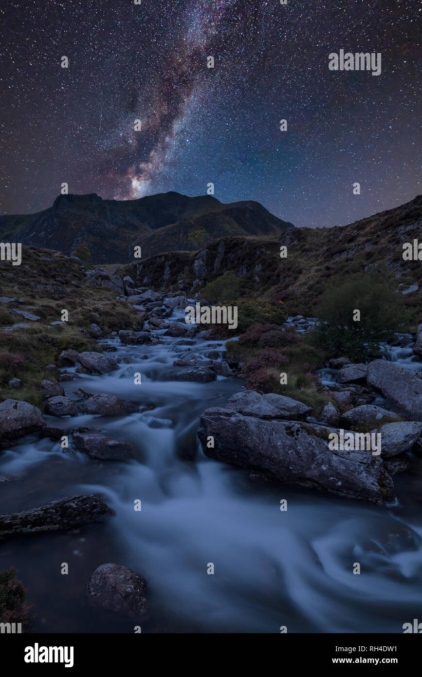 Stunning vibrant Milky Way composite image over Landscape image of ...