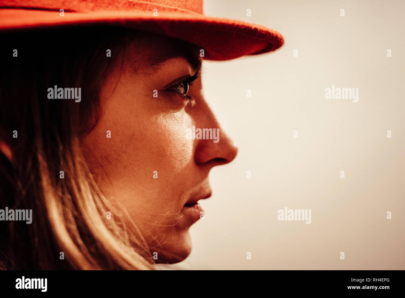 Close up profile serious woman looking away Stock Photo