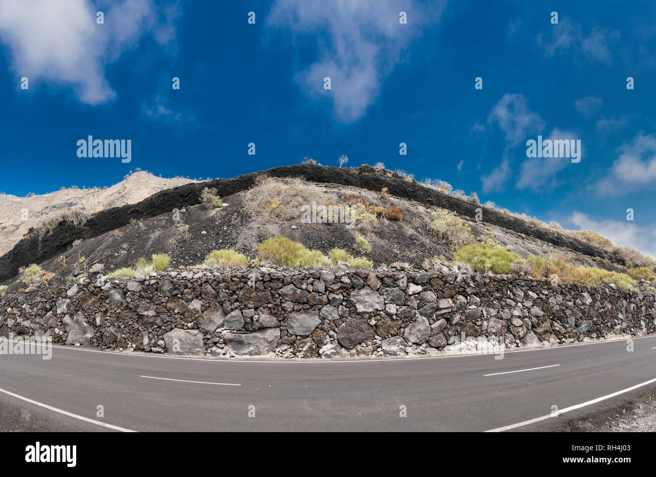 The Caldereta de Las Indias Cinder Cone is a small mafic phreatomagmatic centre partly exposed in a roadcut in southern La Palma, Canary Islands Stock Photo