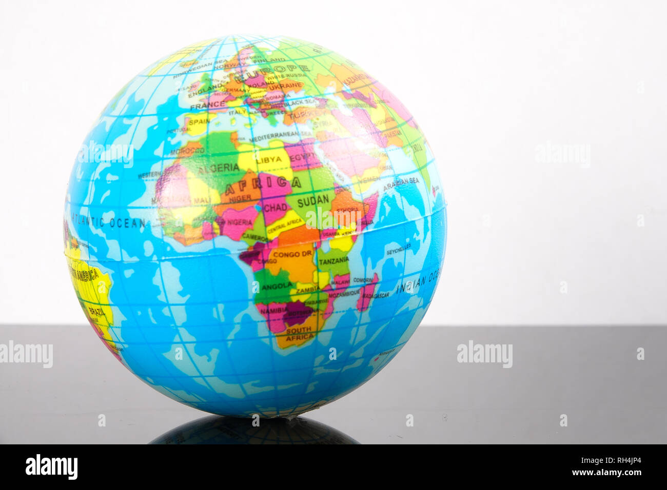 World globe with reflection. Globalization Concept Stock Photo