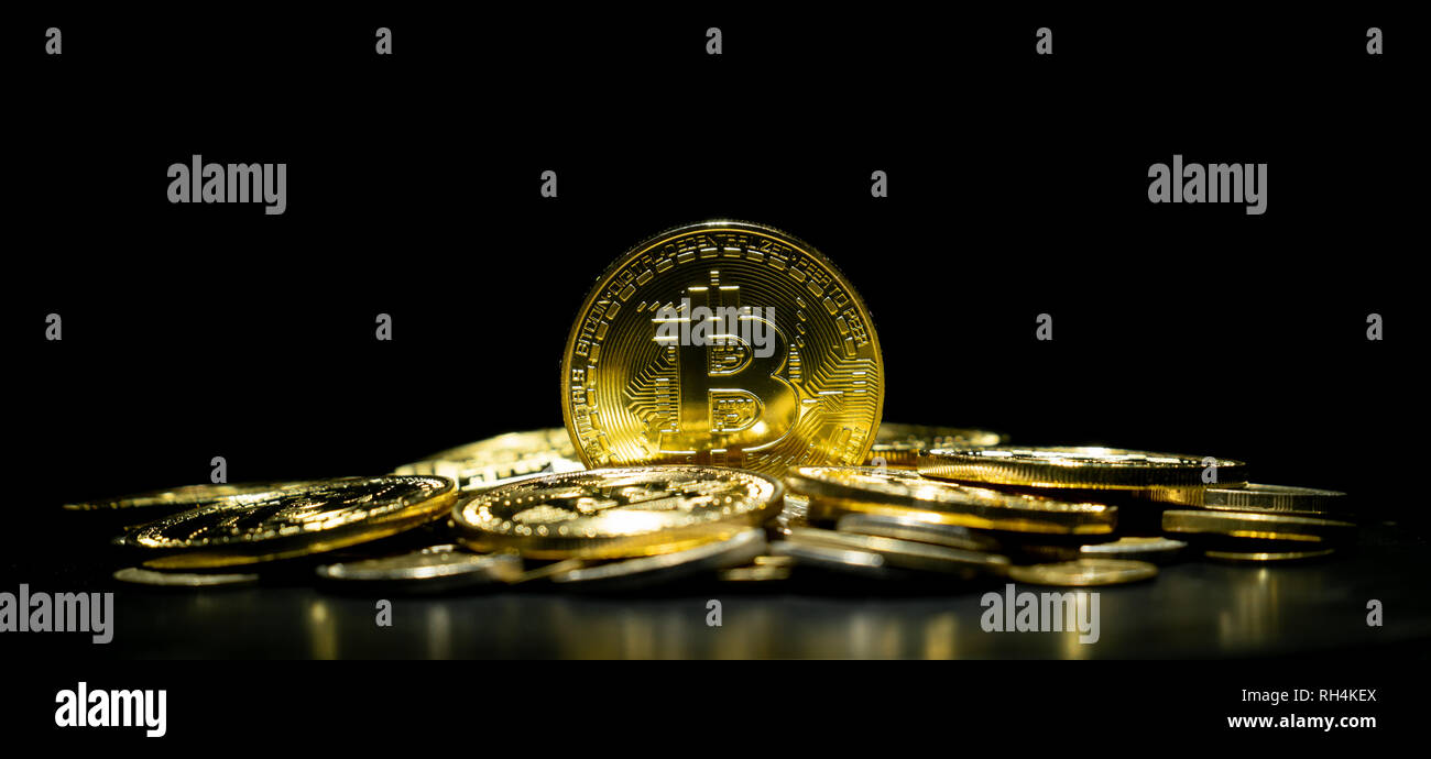 golden bitcoin cryptocurrency in dark background Stock Photo