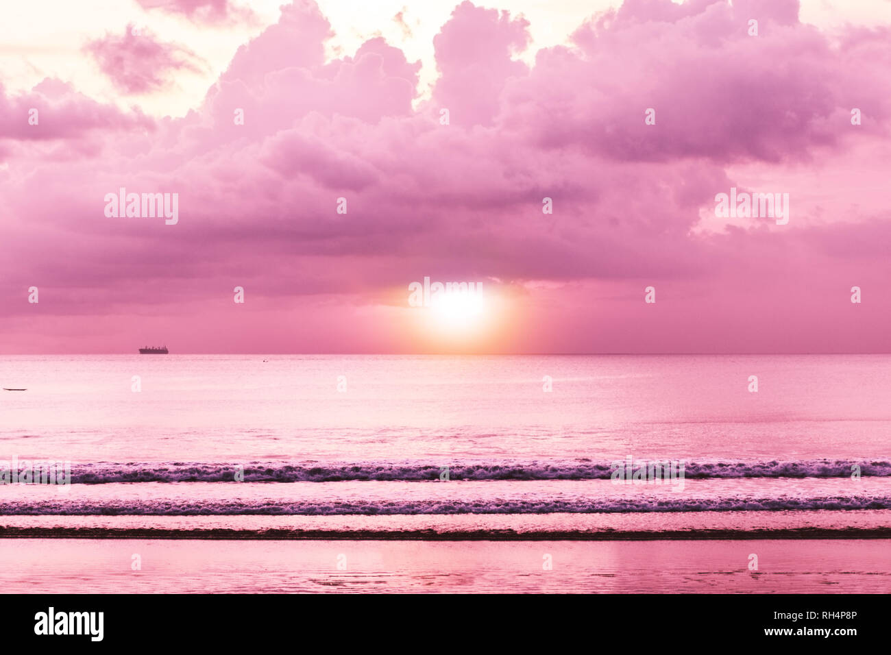 Colorful tropical sunset, sea with sunset, beach view wallpaper. Beautiful  cloudscape over the sea. Toned in warm pink colors. Bali, Indonesia Stock  Photo - Alamy