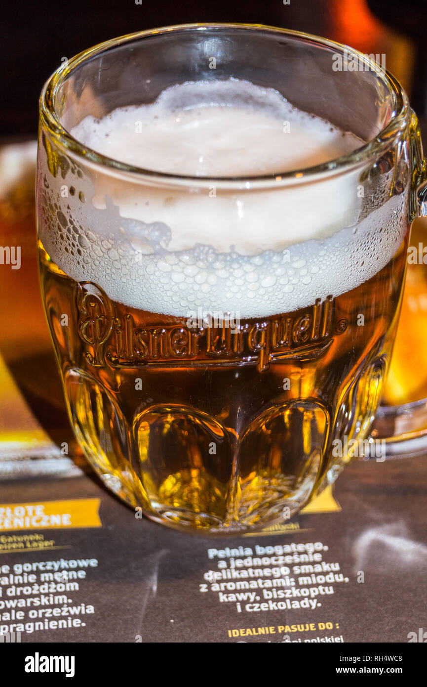PHOTOGRAPH 250ml glass of Pilsner Urquell Czech lager beer, in branded glass, Gdańsk, Poland Stock Photo