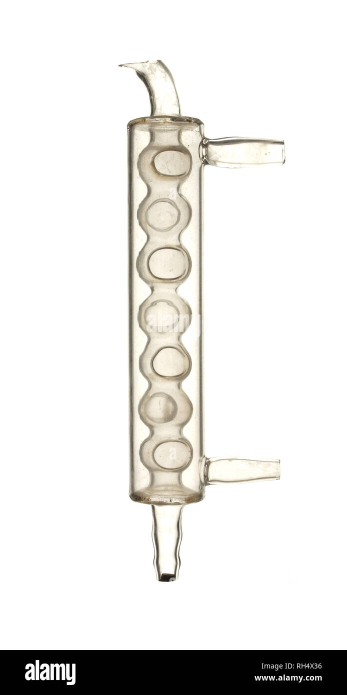 Glass condenser for distillation isolated on white background Stock
