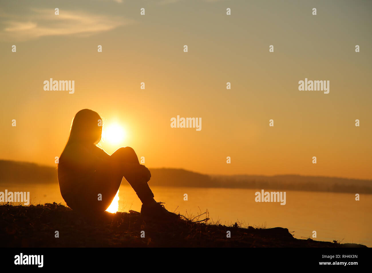 Girl Watching Sunset High Resolution Stock Photography and Images - Alamy