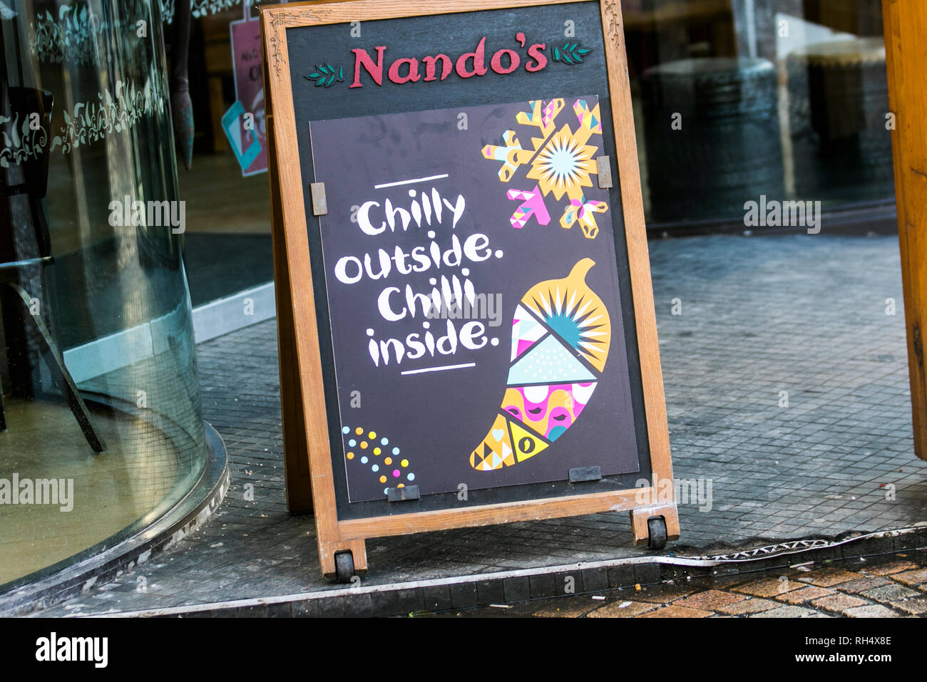 Nanodo's Hot food A board, sign advertising winter foods, Blackpool, UK Stock Photo