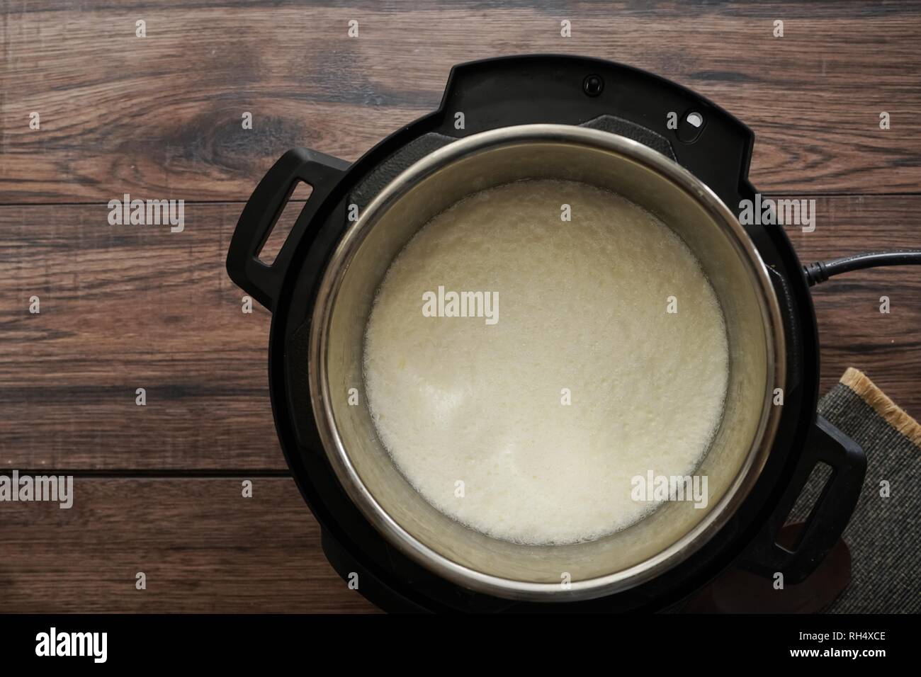 Homemade Yogurt in Pressure cooker, selective focus Stock Photo Alamy