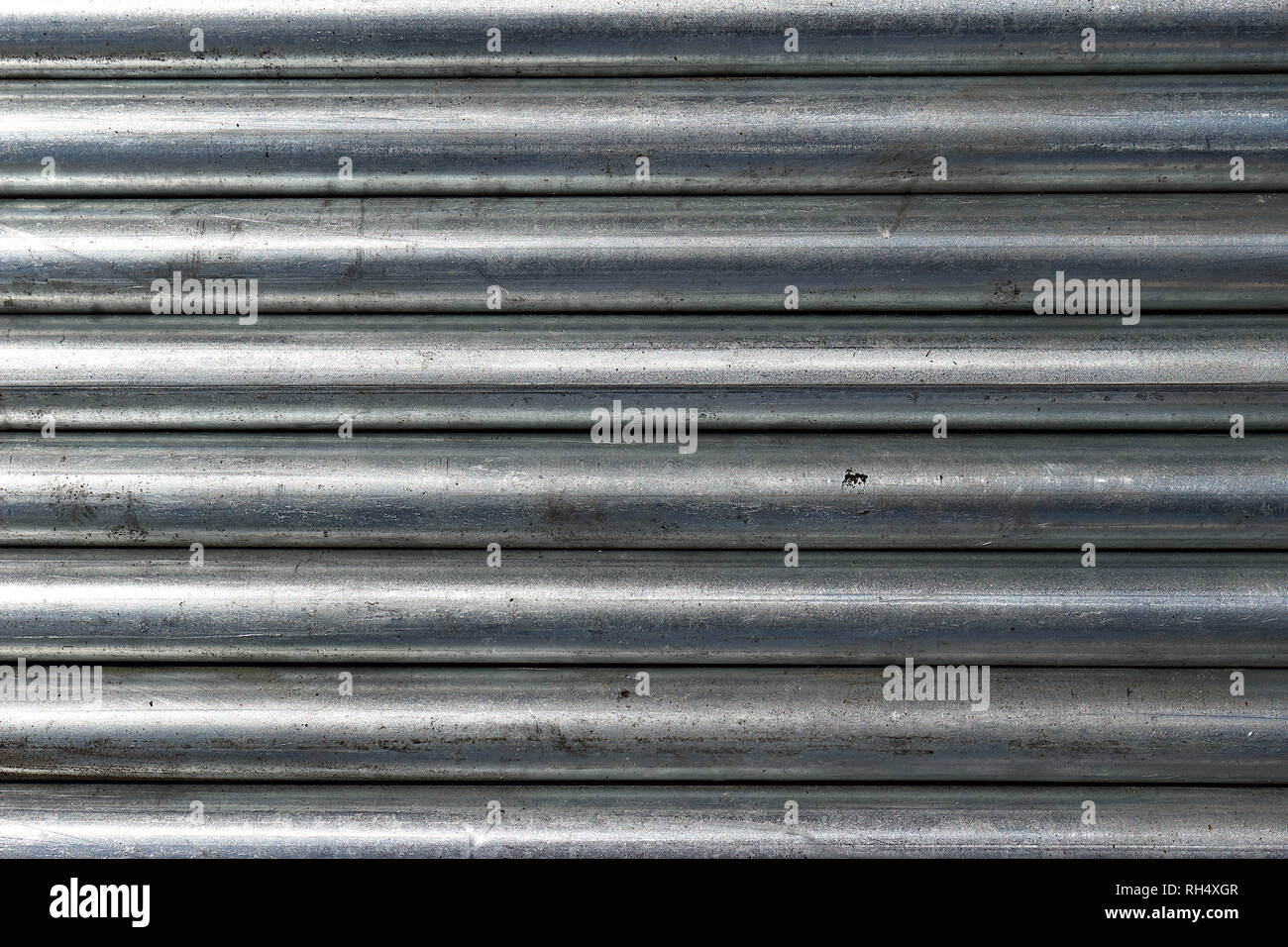 Galvanized steel pipe are put together in a horizontal position Stock