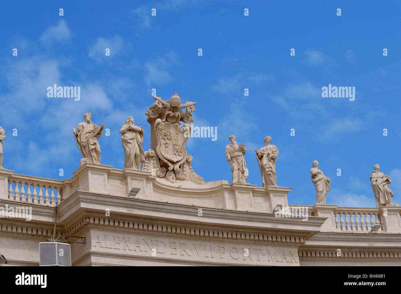 Statues on top of Bernini's Colonnade in St. Peter's Square the Vatican Stock Photo